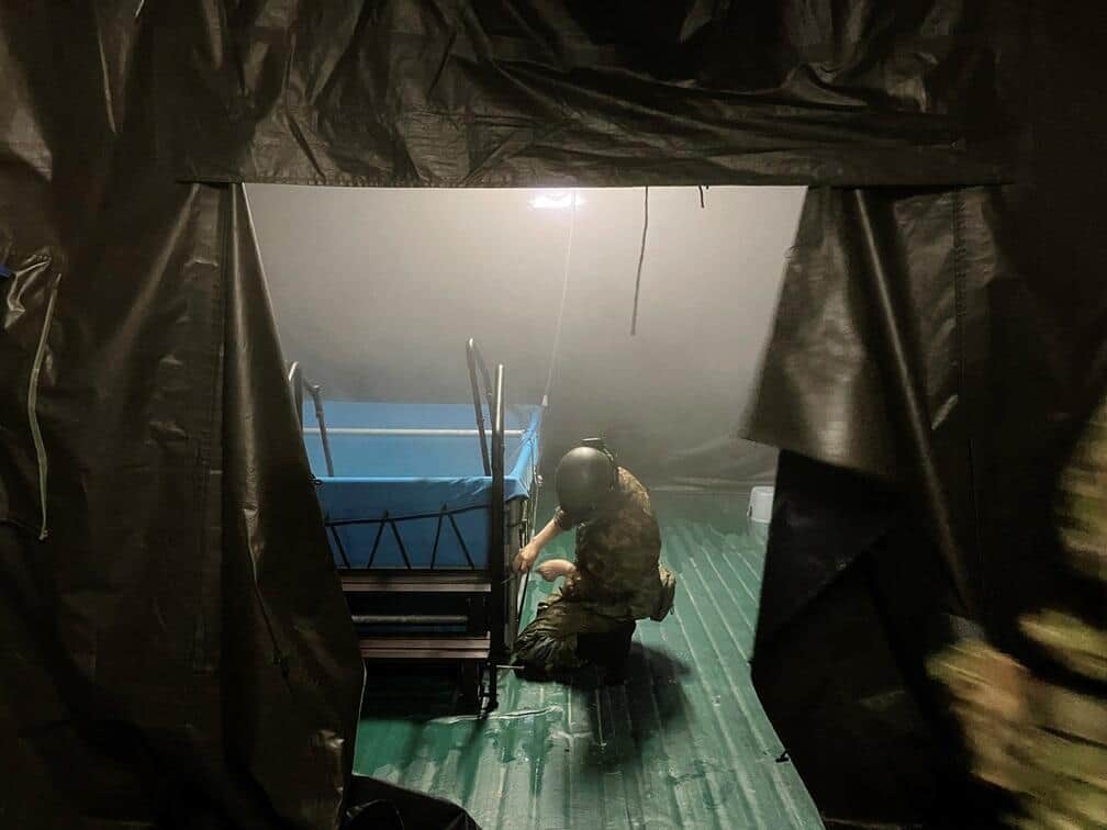 珠洲市では、自衛隊による入浴支援が行われた（写真：ロイター/アフロ）